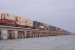 CSX WB intermodal about to hit the signal for the drawbridge